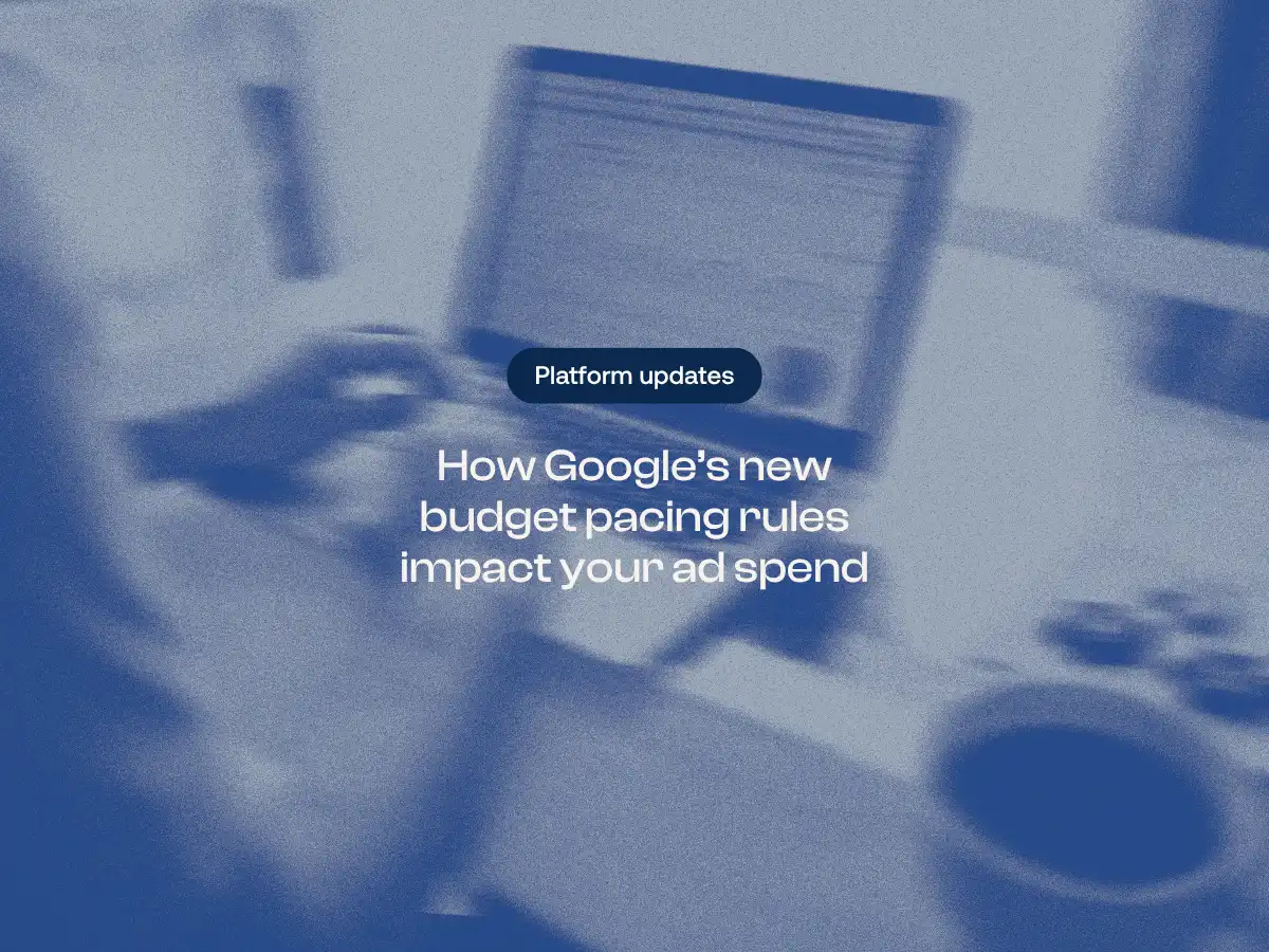 A blurred, blue-toned overhead view of a person working on a laptop with a coffee cup nearby. Centered text reads 